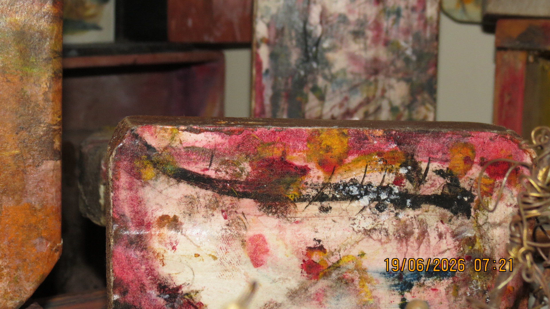 Studio materials — paint cans and mixed media
