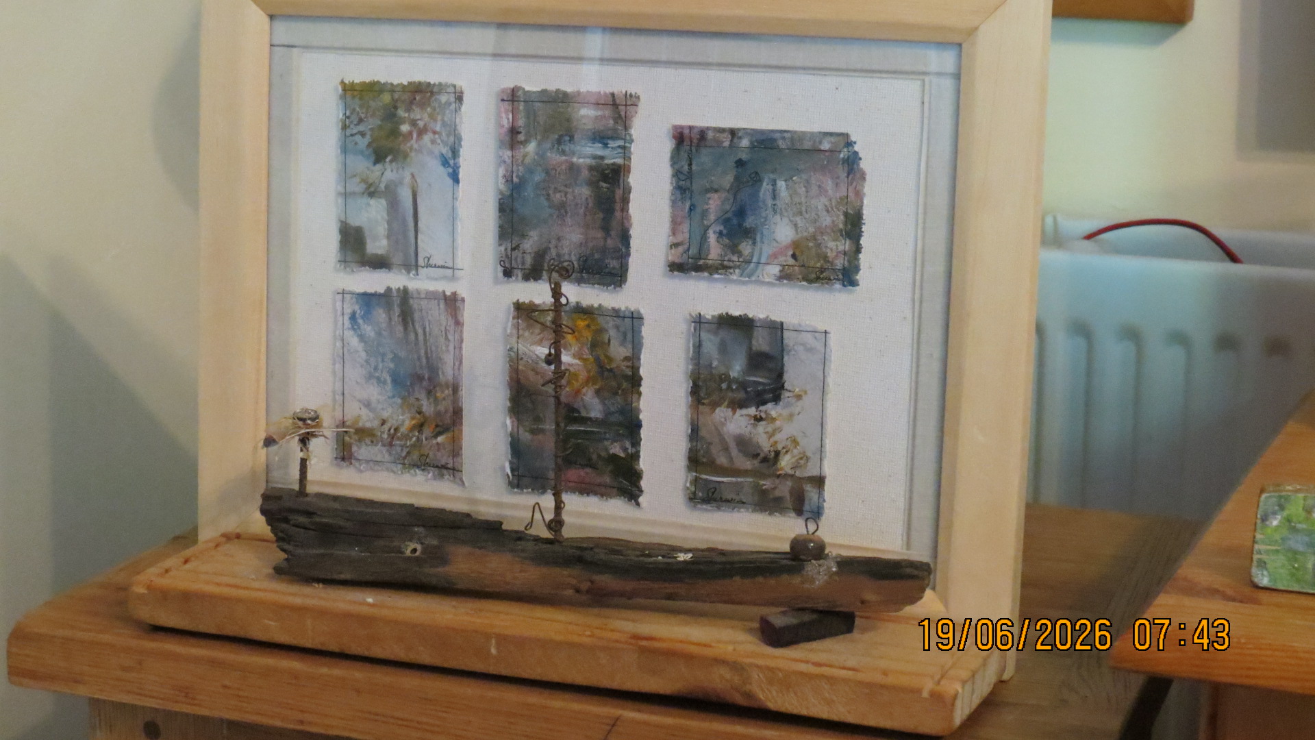 Driftwood boat with miniature watercolour collection